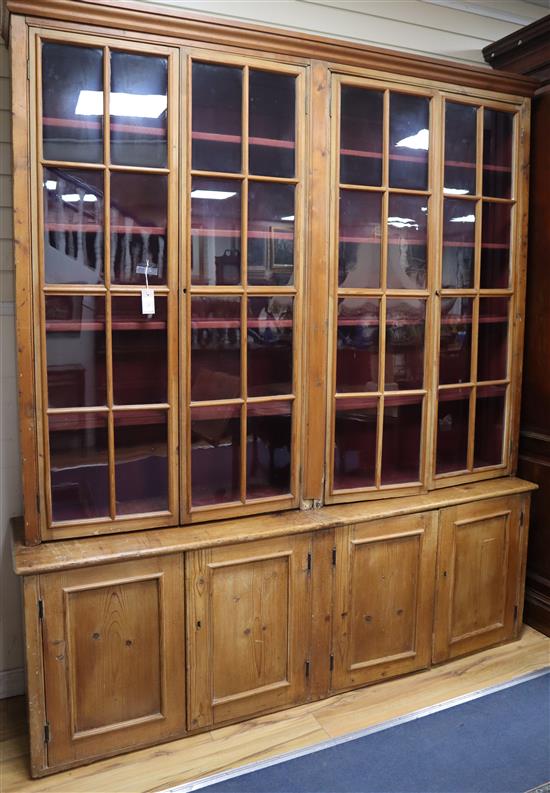 A 19th century pine cabinet, in two parts W.189cm